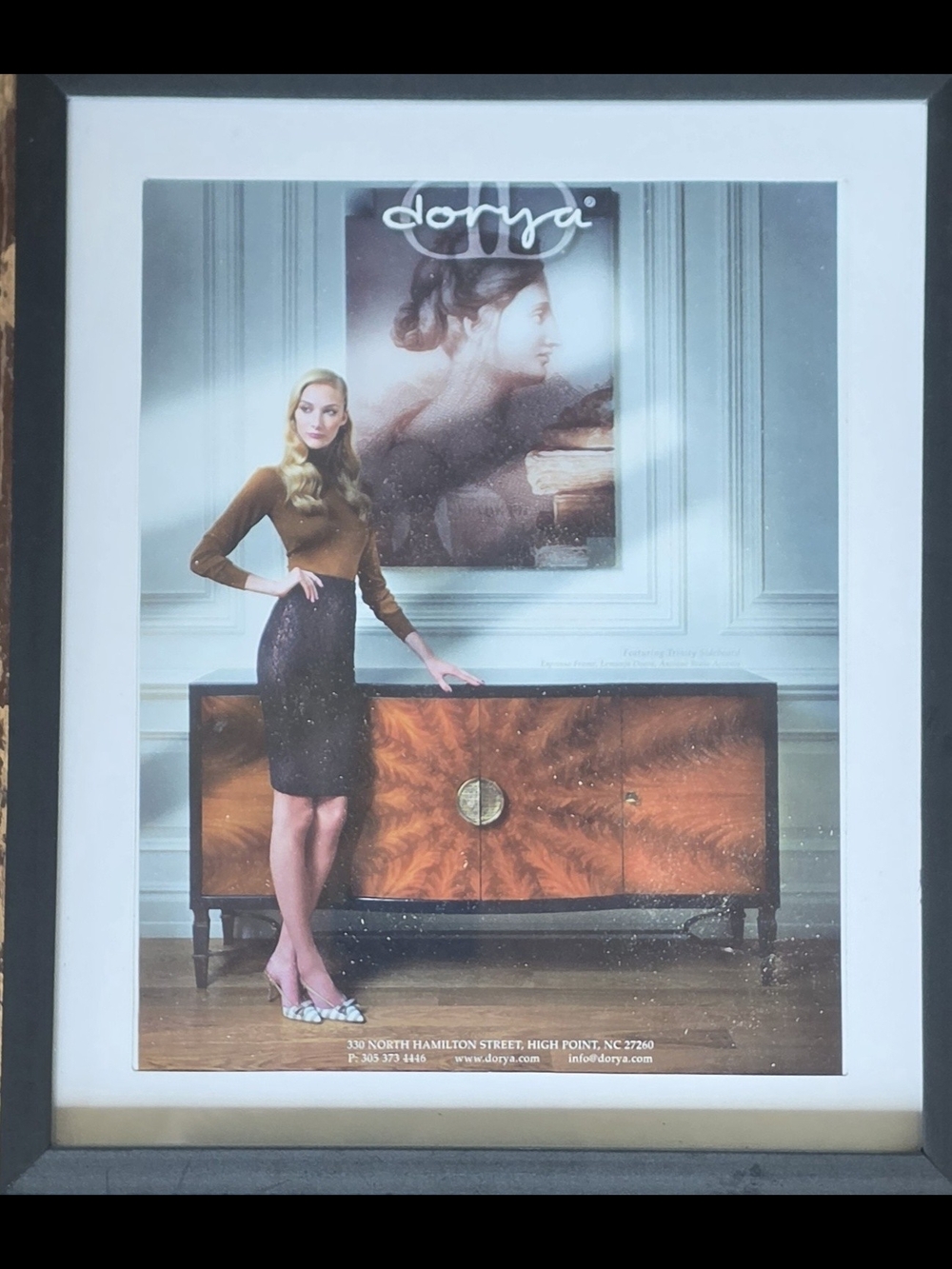A Dorya Interiors framed Print ad featuring their luxurious hardwood Design